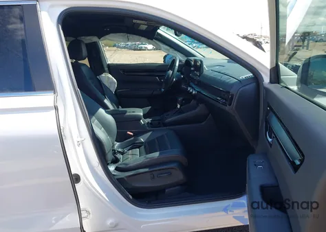 2023 Honda Cr-V Hybrid Sport Touring z USA, uszkodzony, nr VIN 5J6RS6H9XPL003899